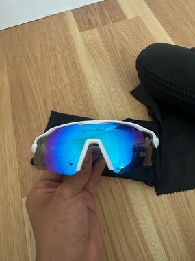 Oakley White Frame Sunglasses with Blue Mirrored Lens